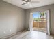Bright bedroom features ceiling fan and sliding glass door with access to an outdoor balcony at 10410 N Cave Creek Rd # 2114, Phoenix, AZ 85020