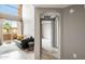 Inviting living room features modern design and an abundance of natural light from large windows at 10410 N Cave Creek Rd # 2114, Phoenix, AZ 85020