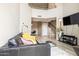 Spacious living room with wood floors, comfortable seating, and bright natural light at 10410 N Cave Creek Rd # 2114, Phoenix, AZ 85020