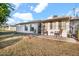 Enjoy outdoor living on this backyard patio with seating, perfect for entertaining at 10414 N 105Th Ave, Sun City, AZ 85351