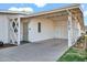 White painted carport with cross-hatched design detail at 10414 N 105Th Ave, Sun City, AZ 85351