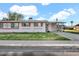Charming single-story home with a well-manicured lawn and traditional architectural details at 10414 N 105Th Ave, Sun City, AZ 85351