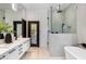 Bathroom featuring a soaking tub, walk-in shower, and dual vanity at 10819 E Butherus Drive --, Scottsdale, AZ 85255
