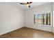 Bright bedroom featuring natural light and hardwood floors at 10819 E Butherus Drive --, Scottsdale, AZ 85255