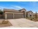 Charming home with a three-car garage and landscaped front yard at 10819 E Butherus Drive --, Scottsdale, AZ 85255