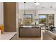 Well appointed kitchen featuring a modern design, island and bright natural light at 10819 E Butherus Drive --, Scottsdale, AZ 85255