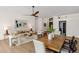 Bright living room with modern furnishings, light wood floors and dining area at 10819 E Butherus Drive --, Scottsdale, AZ 85255
