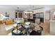 Stylish open-concept living space with modern kitchen and dining area with stainless steel appliances at 10819 E Butherus Drive --, Scottsdale, AZ 85255