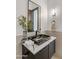 Elegant powder room featuring a unique sink and decorative lighting at 10819 E Butherus Drive --, Scottsdale, AZ 85255