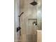Close-up of tiled shower with rainfall showerhead and built-in niche at 10819 E Butherus Drive --, Scottsdale, AZ 85255