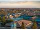 An aerial view showcases the beautiful surrounding community at 11034 E Natal Ave, Mesa, AZ 85209