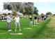 Golfers practicing at the beautiful community golf course and training center at 11034 E Natal Ave, Mesa, AZ 85209