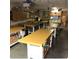 This workshop includes storage and work tables for projects at 11034 E Natal Ave, Mesa, AZ 85209