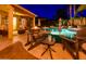 This home has a large backyard with a swimming pool and an outdoor entertainment area at 11182 S Hopi Dr, Goodyear, AZ 85338