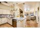 Gourmet kitchen featuring granite countertops, stainless steel appliances, and an open-concept layout at 11182 S Hopi Dr, Goodyear, AZ 85338