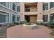 Beautiful courtyard featuring a central fountain and brick-paved area, adding charm to the building's entrance at 11640 N Tatum Blvd # 3069, Phoenix, AZ 85028