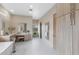Bathroom featuring a vanity, walk-in closet, heated towel rack, and soaking tub at 12201 N 65Th St, Scottsdale, AZ 85254