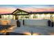 Modern home with desert landscaping, lighted pathway, address displayed on retaining wall, and contemporary architectural details at 12201 N 65Th St, Scottsdale, AZ 85254