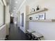 Stylish hallway with modern decor, floating shelves, and comfortable seating offering a welcoming ambiance at 12201 N 65Th St, Scottsdale, AZ 85254