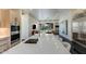 Modern kitchen featuring high-end appliances, spacious island with seating, and sleek countertops at 12201 N 65Th St, Scottsdale, AZ 85254