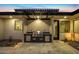 Outdoor kitchen with built-in grill and counter space, perfect for outdoor cooking and entertaining in the backyard at 12201 N 65Th St, Scottsdale, AZ 85254