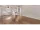 Bright living room featuring wood floors, fresh paint, and an open floorplan at 12221 W Bell Rd # 249, Surprise, AZ 85378