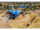 Aerial photograph of the playground, train and lake offering recreational activities at 1237 N Kenneth Pl, Chandler, AZ 85226