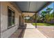 Long backyard patio featuring stylish pavers and shade covering at 1237 N Kenneth Pl, Chandler, AZ 85226