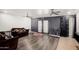 Open living area with plank floors, ceiling fans, and stylish decor at 13201 N 24Th Ave, Phoenix, AZ 85029