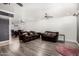 Spacious living area with plank floors, a ceiling fan, and an adjacent dining area at 13201 N 24Th Ave, Phoenix, AZ 85029