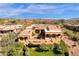 Luxury estate home with beautiful landscaping, an outdoor pool, and amazing rooftop views at 14675 E Paradise Dr, Fountain Hills, AZ 85268