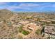 Panoramic aerial view of a beautiful desert property with a pool, tile roofs, and scenic city views at 14675 E Paradise Dr, Fountain Hills, AZ 85268