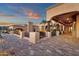 Spacious outdoor brick patio featuring multiple gathering spots and access to the main house at 14675 E Paradise Dr, Fountain Hills, AZ 85268