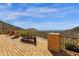 Elevated outdoor terrace with captivating mountain views, stone columns, and privacy at 14675 E Paradise Dr, Fountain Hills, AZ 85268