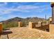 Desert mountain views abound from this open balcony with brick flooring and secure railings at 14675 E Paradise Dr, Fountain Hills, AZ 85268