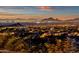 Breathtaking city views at night from this hillside home create a stunning backdrop at 14675 E Paradise Dr, Fountain Hills, AZ 85268