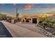 Desert property featuring desert landscaping, circular driveway and privacy at 14675 E Paradise Dr, Fountain Hills, AZ 85268