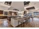 Expansive kitchen with large island, stone accents, custom cabinetry, and an open design at 14675 E Paradise Dr, Fountain Hills, AZ 85268
