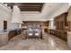 Spacious kitchen with stainless steel appliances, a large island, and custom wood cabinetry at 14675 E Paradise Dr, Fountain Hills, AZ 85268