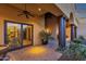 Outdoor patio featuring decorative columns, brick pavers and potted plants at 14675 E Paradise Dr, Fountain Hills, AZ 85268