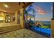 Spacious brick patio with stairs leading to a lower level with a pool, plus mountain views at 14675 E Paradise Dr, Fountain Hills, AZ 85268