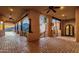 A beautiful patio with columns that offers stunning views of the valley and desert landscape at 14675 E Paradise Dr, Fountain Hills, AZ 85268