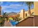 Luxury home featuring a stunning pool and a bridge offering captivating mountain views at 14675 E Paradise Dr, Fountain Hills, AZ 85268