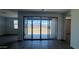 View of backyard with open patio and perimeter block wall at 15769 W Beryl Ave, Waddell, AZ 85355