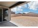 View of spacious backyard with a large, potential area for landscaping at 15769 W Beryl Ave, Waddell, AZ 85355