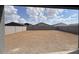 Expansive dirt backyard, providing a blank canvas for landscaping and outdoor living at 15769 W Beryl Ave, Waddell, AZ 85355