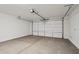 Clean, well-lit two-car garage with a modern door and plenty of space at 15769 W Beryl Ave, Waddell, AZ 85355
