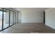 Spacious living room with tile floors and large sliding glass doors providing ample natural light at 15769 W Beryl Ave, Waddell, AZ 85355