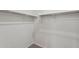 Spacious walk-in closet with carpet, white walls, and ample hanging space on metal rods at 15769 W Beryl Ave, Waddell, AZ 85355