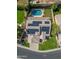 Aerial view of house with backyard pool and solar panels on a red tiled roof at 16018 N 17Th Way, Phoenix, AZ 85022